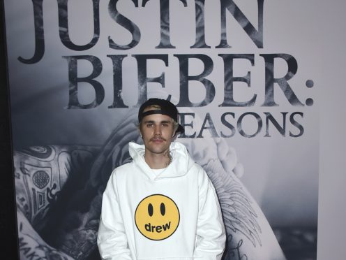Justin Bieber has spoken candidly about his drug use and revealed at his lowest point he would wake up and immediately smoke cannabis and swallow pills (Jordan Strauss/Invision/AP)