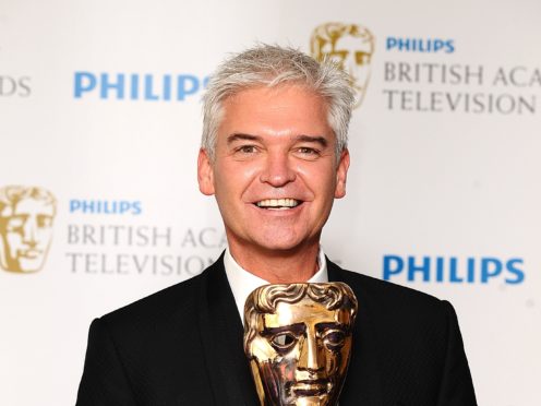 Phillip Schofield’s mother has told of her pride in her TV presenter son after he came out as gay (Ian West/PA)