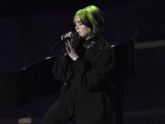 Billie Eilish performed during the in memoriam tribute at the Oscars, but the segment was criticised for not including Luke Perry (AP Photo/Chris Pizzello)