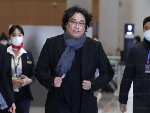 South Korean director Bong Joon-ho arrives at the Incheon International Airport in Incheon, South Korea (Ahn Young-joon/AP)