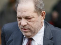 A British woman who alleges she was sexually assaulted by Harvey Weinstein has admitted to feeling ‘torn’ after he was acquitted of some of the charges he faced (John Minchillo/AP)