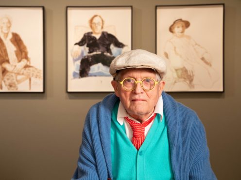 David Hockney with drawings from his exhibition David Hockney: Drawing from Life (David Parry/National Portrait Gallery)