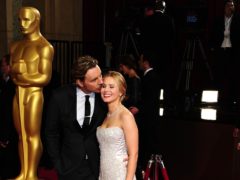 Frozen star Kristen Bell lifted the spirits of isolating husband Dax Shepard by dancing outside the apartment he is quarantined in (Ian West/PA)