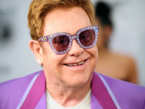 Sir Elton John said he had been playing snakes and ladders while staying in (Matt Crossick/PA)