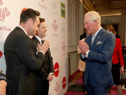 The Prince of Wales uses a Namaste gesture (Yui Mok/PA)