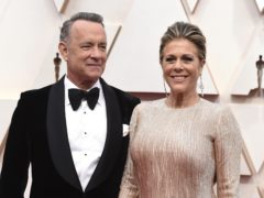 Tom Hanks said he and wife Rita Wilson are taking it “one day at a time” after they were both diagnosed with Covid-19 (Jordan Strauss/Invision/AP, File)