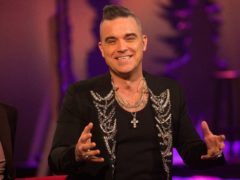 Robbie Williams said his experiences with the paranormal have stopped since he became a father (PA Images on behalf of So TV)