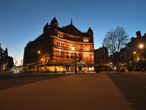 The Palace Theatre, which usually shows the Harry Potter and the Cursed Child play, sits in a deserted Shaftesbury Avenue (Victoria Jones/PA)