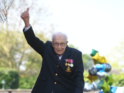 War veteran Captain Tom Moore celebrates the completion of his garden challenge (Joe Giddens/PA)
