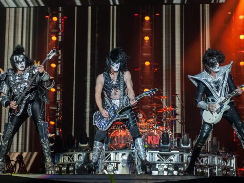 Gene Simmons, Tommy Thayer and Paul Stanley of Kiss on stage (Katja Ogrin/PA)