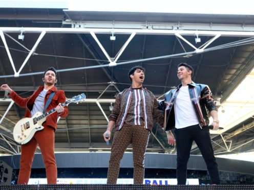 Kevin Jonas, Joe Jonas and Nick Jonas have joined the billing (Isabel Infantes/PA)