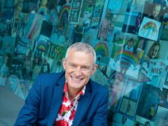 Jeremy Vine with rainbow pictures sent in by viewers of his Channel 5 show (Dominic Lipinski/PA)