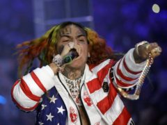Rapper Tekashi 6ix9ine has released his first new song since a judge freed him from prison early over coronavirus fears (AP Photo/Luca Bruno, File)