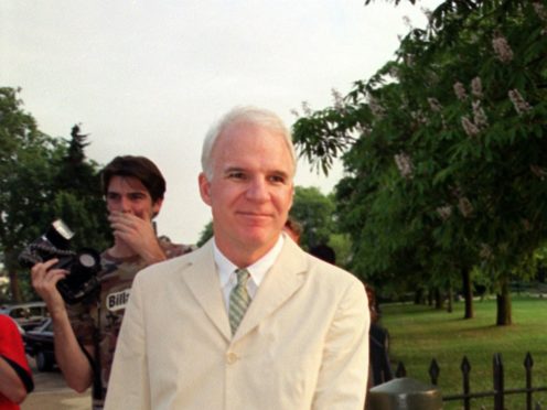 Actor and comedian Steve Martin is auctioning off one of his trademark white three-piece suits for charity (PA)