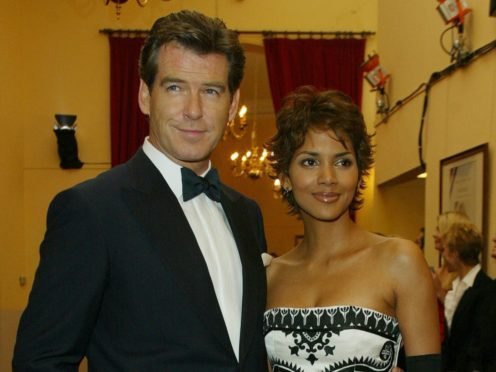 Pierce Brosnan said he ‘vaguely’ remembers saving Halle Berry from choking on the set of Die Another Day (PA)