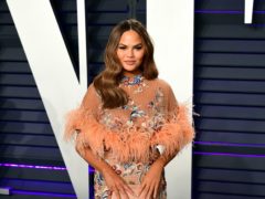 Chrissy Teigen has had her breast implants removed – and revealed a hilarious letter from her four-year-old daughter (Ian West/PA)