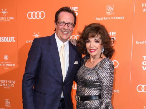 Percy Gibson and Joan Collins are separated by 32 years (Matt Crossick/PA)