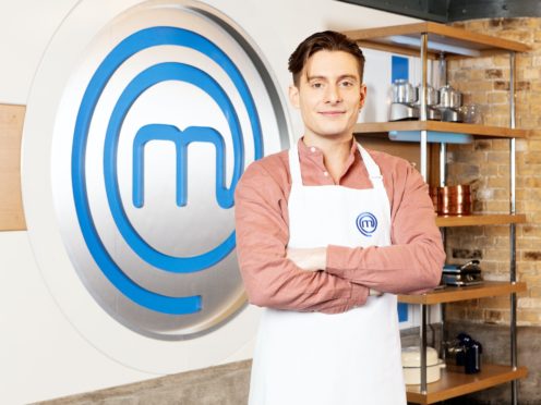 Riyadh Khalaf, the winner of Celebrity MasterChef, with his trophy (Dominic Lipinski/PA)