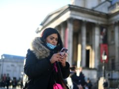 A woman outside the National Gallery (Victoria Jones/PA)
