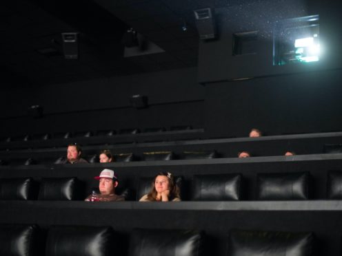 Film goers at the Showcase Cinema at Bluewater in Kent sit down, socially distanced, to watch a film on Saturday July 4 (Stefan Rousseau/PA)