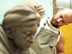 Sculptor Andrzej Szymczyk crafts a life-size dynamic statue of Harry Potter, played by Daniel Radcliffe (Heart of London Business Alliance/PA)
