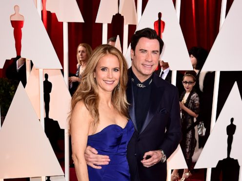 John Travolta and wife Kelly Preston arriving at the 87th Academy Awards in 2015 (PA)