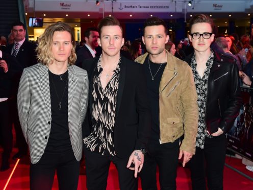 McFly will feature in an ‘intimate and emotional’ one-off ITV special documenting the band’s history (Ian West/PA)