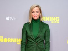 An emotional Reese Witherspoon said the world could do with more people like her character Elle Woods as she hosted a Legally Blonde reunion (Ian West/PA)