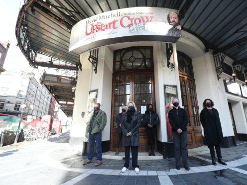 The ‘silent stand’ on behalf of the UK theatre industry outside the Gielgud Theatre, in Shaftesbury Avenue (Yui Mok/PA)