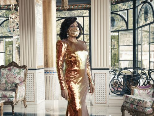 Dame Shirley Bassey, 83, wearing a matching face mask and sequined gold gown during a photo shoot in Italy for her forthcoming album Owe It All To You (Universal Music Group/PA)