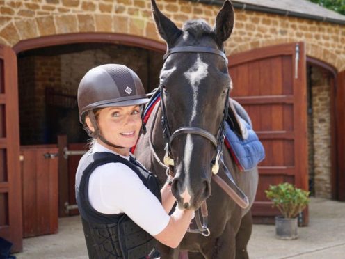 Geri Horner with her rescue horse (Geri Horner/Rainbow Woman)