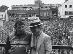 Watford chairman Elton John, wearing the club scarf, with team manager Graham Taylor (PA)