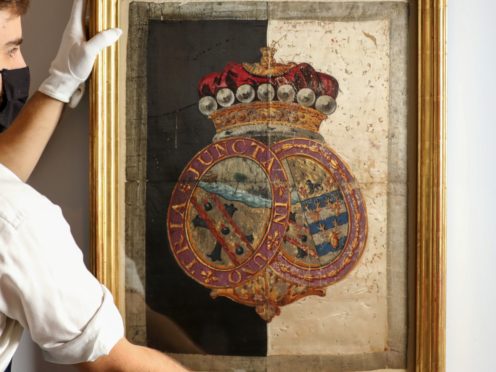 A silk hatchment from Nelson’s funeral carriage is expected to fetch £50,000 at auction (Tristan Fewings/Getty Images for Sotheby’s/PA)