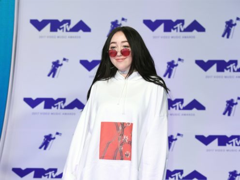 Singer Noah Cyrus has apologised after using an ‘offensive’ term while defending Harry Styles (PA)