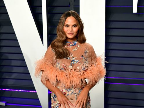 Chrissy Teigen revealed she has given up drinking and said she no longer wants to be embarrassed by what she does while under the influence (Ian West/PA)