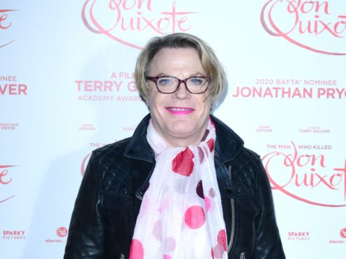 Eddie Izzard now uses the pronouns she and her (Ian West/PA)