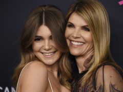Lori Loughlin’s daughter Olivia Jade Giannulli has broken her silence on the college admissions scandal which saw her actress mother and fashion designer father jailed (Chris Pizzello/Invision/AP, File)