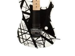 A customised electric guitar once belonging to revered rock star Eddie Van Halen has sold at auction for more than 230,000 dollars (about £173,000) (Julien’s Auctions/PA)