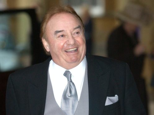 Gerry Marsden arrives at Buckingham Palace (Matthew Fearn/PA)