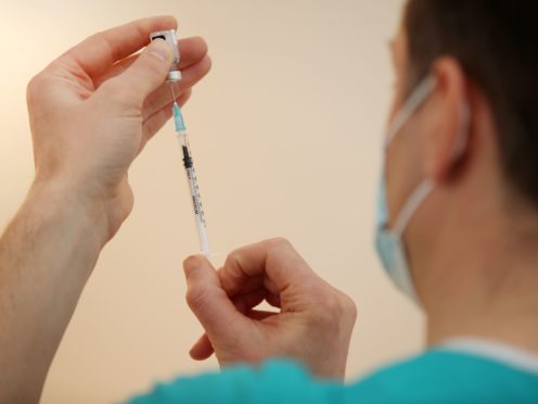 Officials at Public Health England are resisting doctors’ calls to cut the gap between the first and second doses of the Pfizer/BioNTech vaccine (Nick Potts/PA)