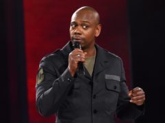Comedian Dave Chappelle has tested positive for Covid-19, a representative said (Netflix/PA)