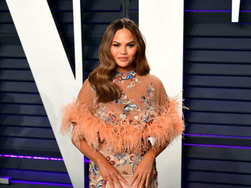 Chrissy Teigen has defended herself after being criticised for tweeting about a bottle of wine costing 13,000 dollars (£9,500) (Ian West/PA)
