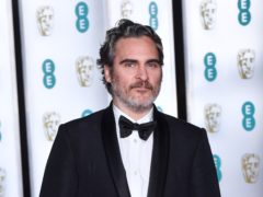 Joaquin Phoenix will be among the presenters at the 78th Golden Globes, the Hollywood Foreign Press Association (HFPA) said (Matt Crossick/PA)