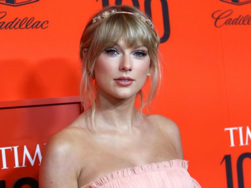 Taylor Swift has been sued by a theme park for trademark infringement over the title of her latest album Evermore (Greg Allen/PA)