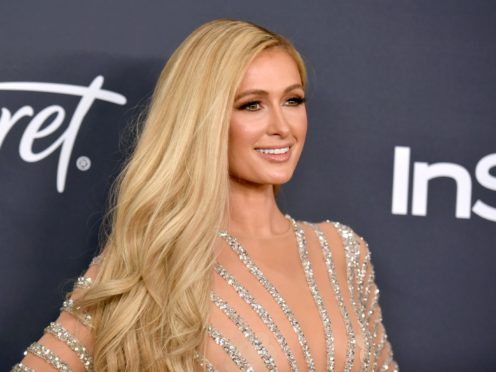 Paris Hilton said she spent years hiding behind a ‘dumb blonde’ persona after enduring a traumatic time at boarding school as a teenager (Richard Shotwell/Invision/AP)