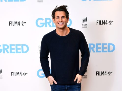 Ollie Locke and his husband Gareth are planning to become parents (Ian West/PA)