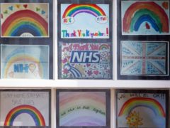 Children’s illustrators and writers have created posters calling for a pay rise for NHS staff (Yui Mok/PA)