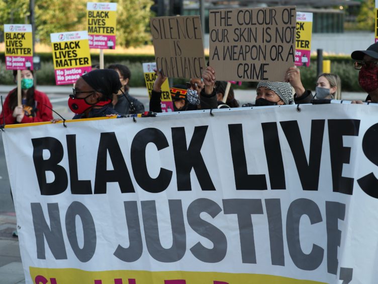 Protesters outside the US Embassy in London (Yui Mok/PA)
