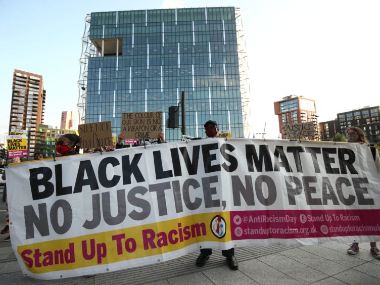 The Commission on Race and Ethnic Disparities has been criticised for its report (Yui Mok/PA)