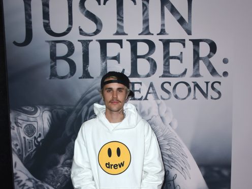 Justin Bieber robs a bank to help his seriously ill girlfriend in the music video for his latest song Hold On (Jordan Strauss/Invision/AP, File)